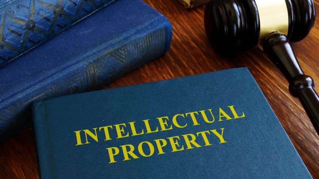 Book titled "Intellectual Property" on top of a table, representing the importance of protecting intellectual property in Singapore