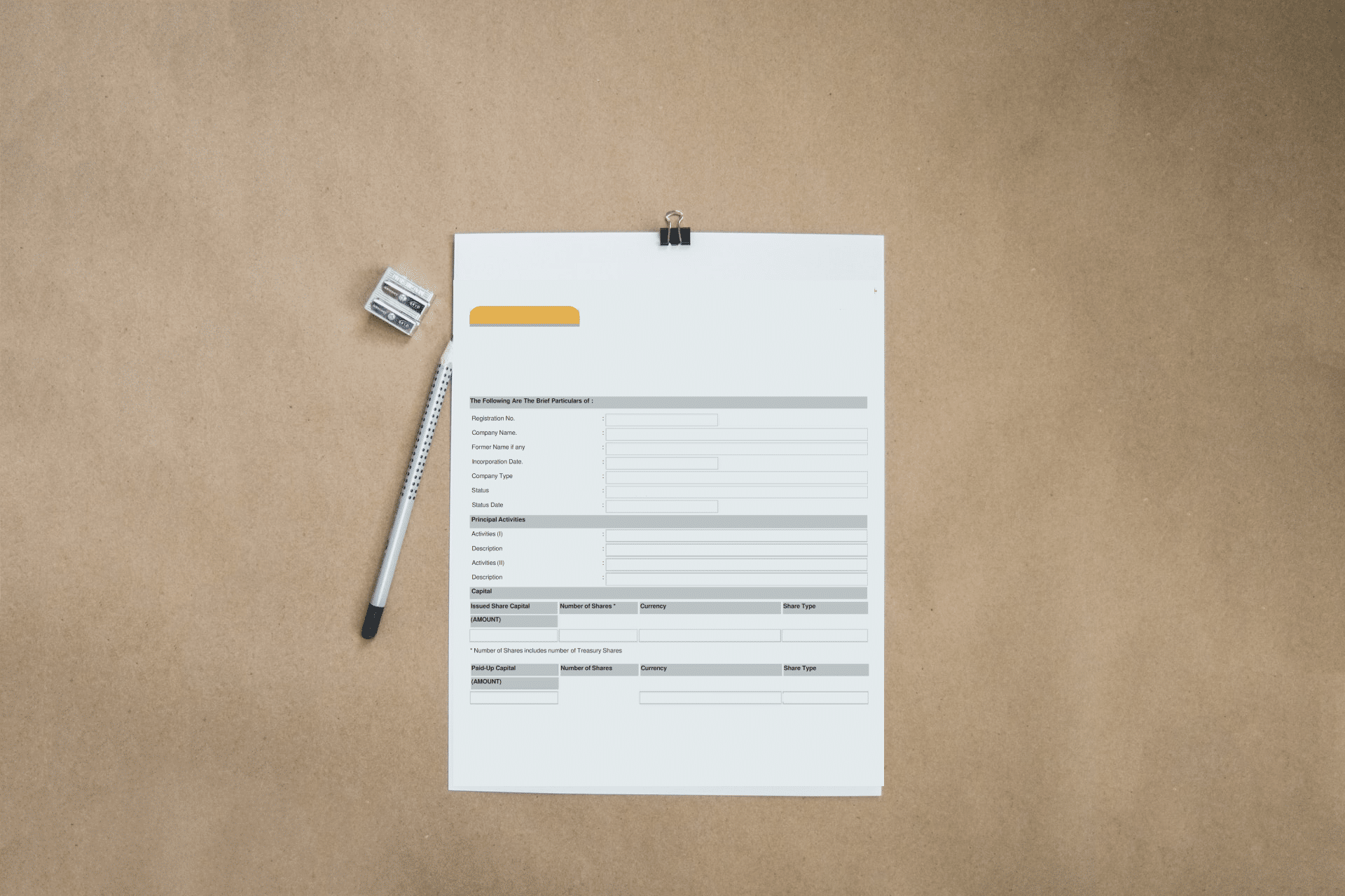 An ACRA business profile document on top of a desk in an office