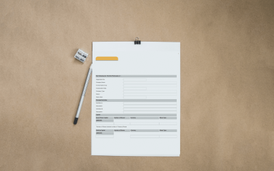 An ACRA business profile document on top of a desk in an office